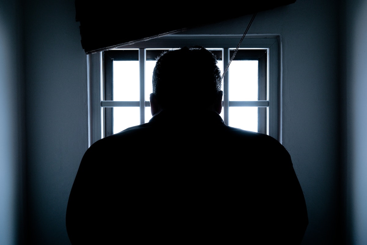 a man inside a jail