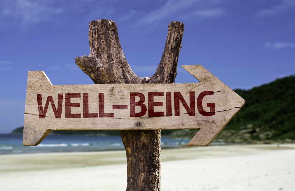 well-being road sign in beach